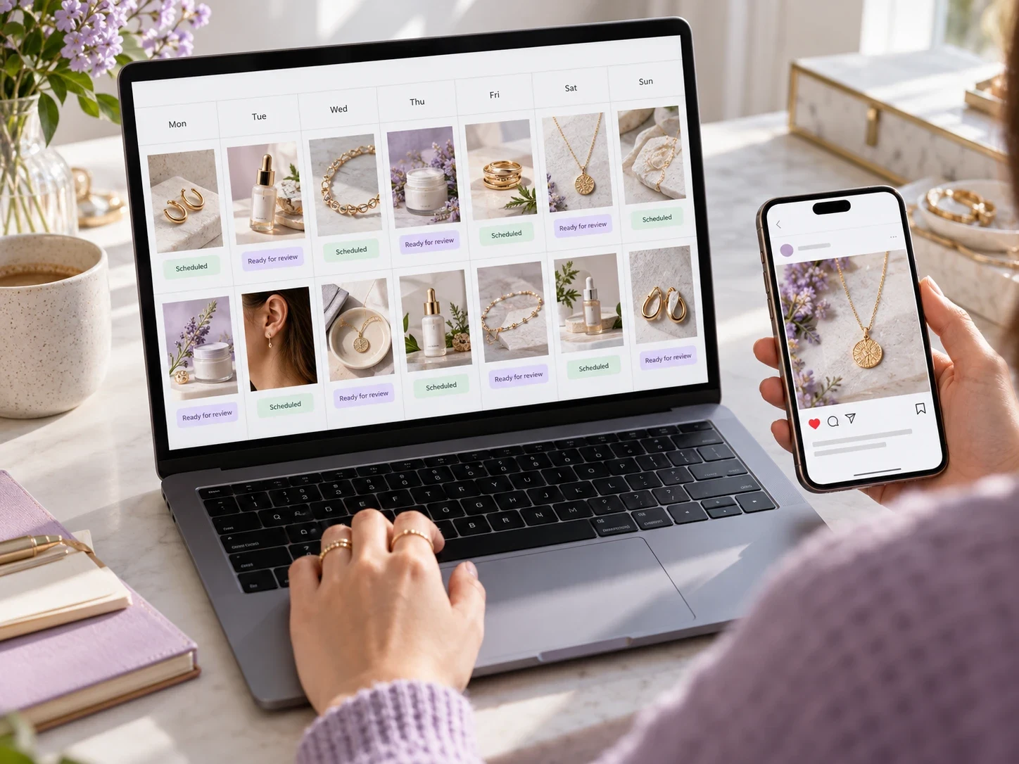 A brand owner reviewing a product social-content calendar on a laptop and a jewelry post on a phone